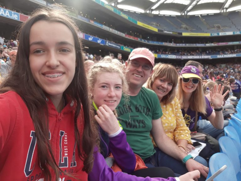 Student on a day trip with host family to a wexford hurling match in croke park